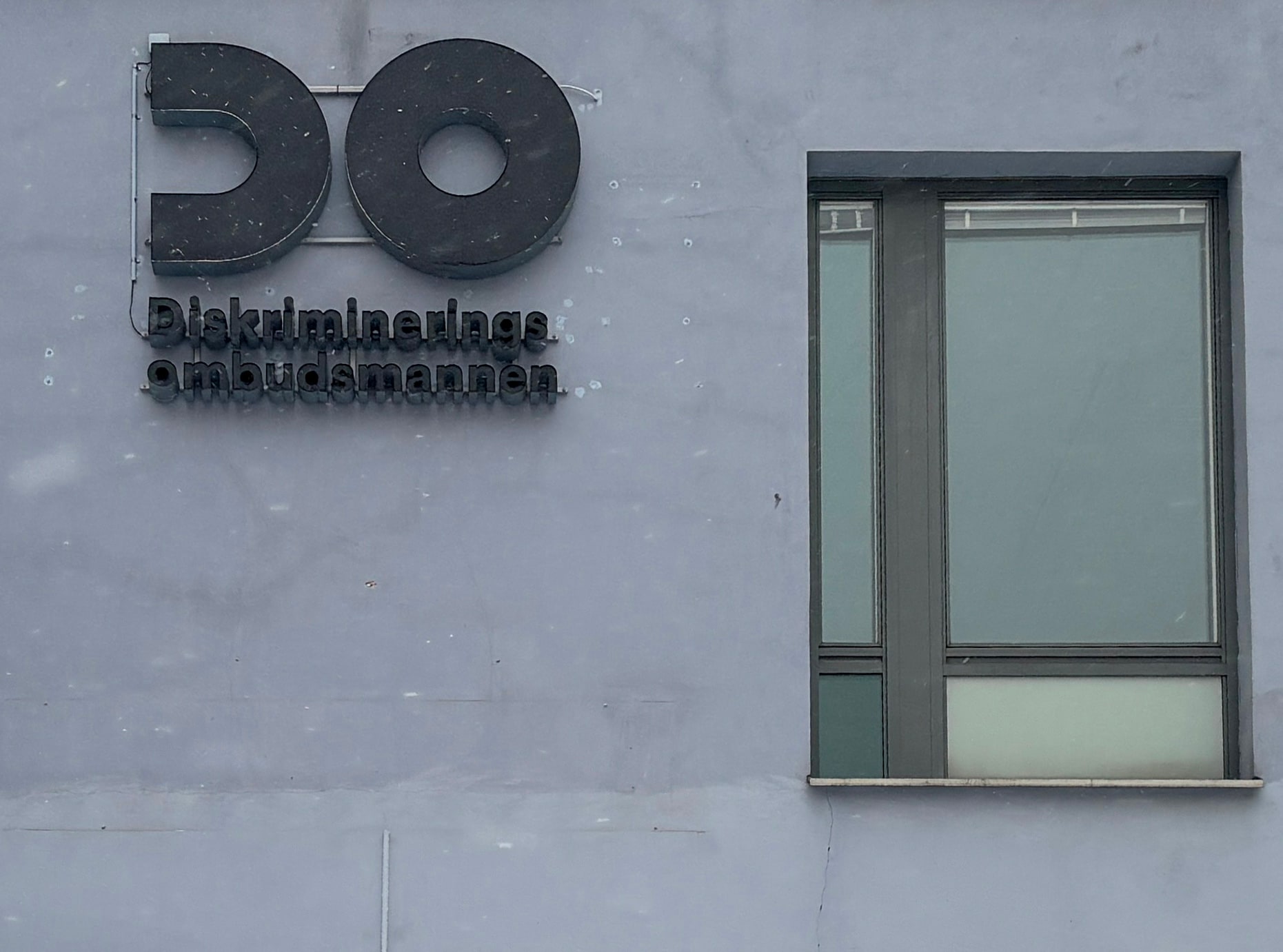 The Discrimination Ombudsman’s sign on an office wall in Solna.