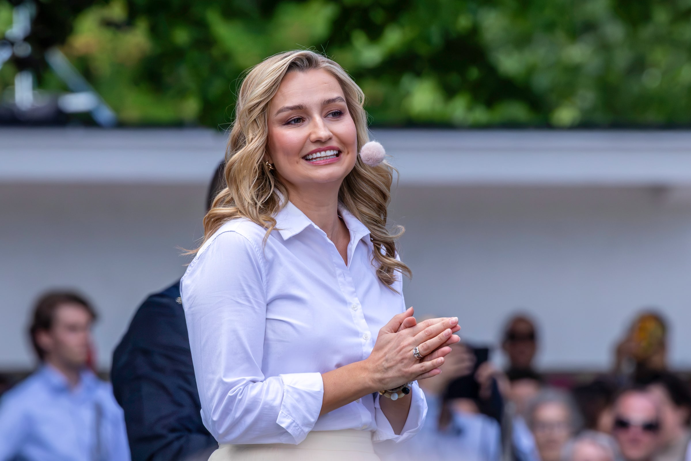 Ebba Busch speaks in a white outfit during Almedalen Week in Visby in June 2026.