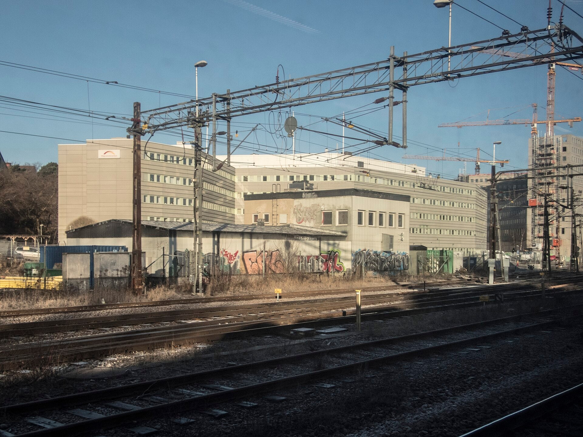 The Swedish Migration Agency office in Solna, seen across railway tracks.