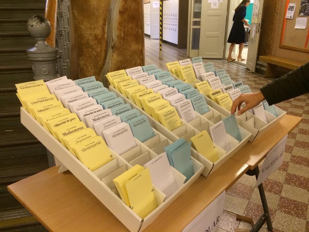 Ballot papers laid out for Sweden's 2014 general election.