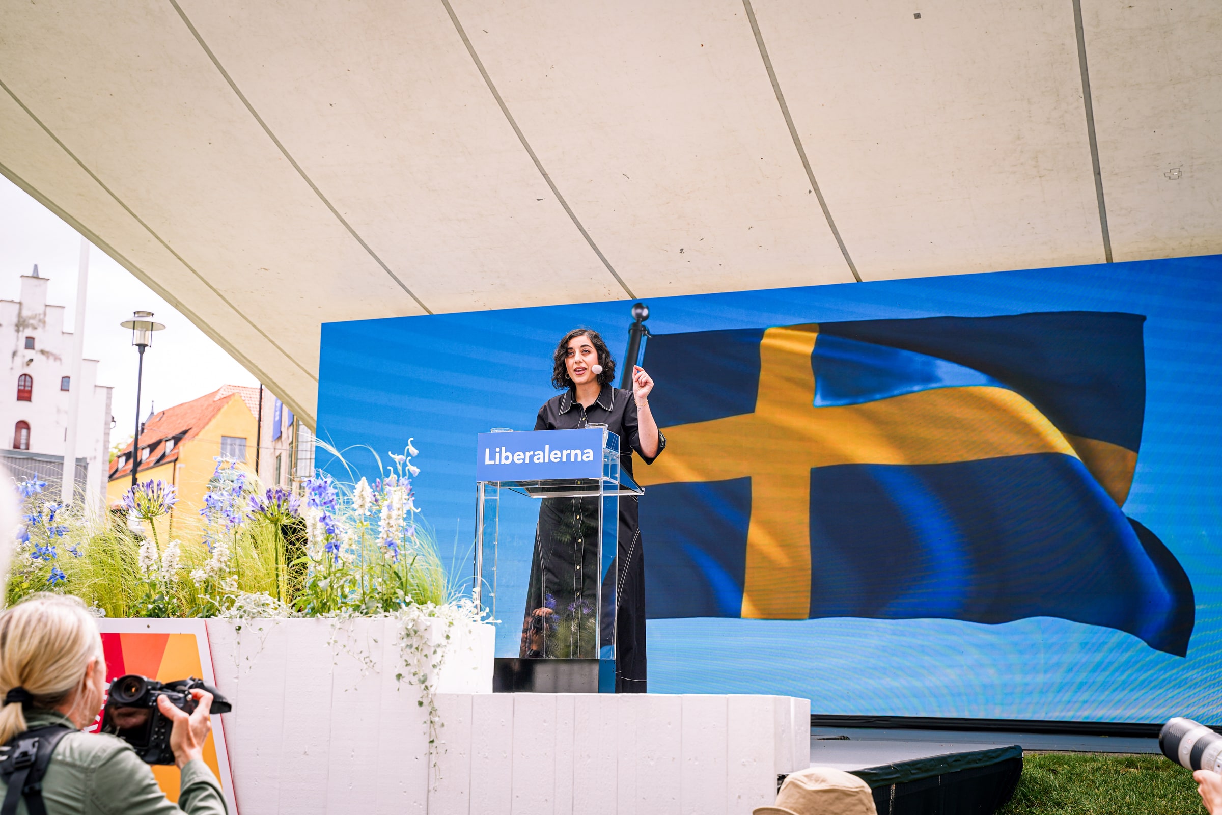Liberal Party leader Simona Mohamsson speaks from a Liberalerna stage at Almedalen in June 2025.