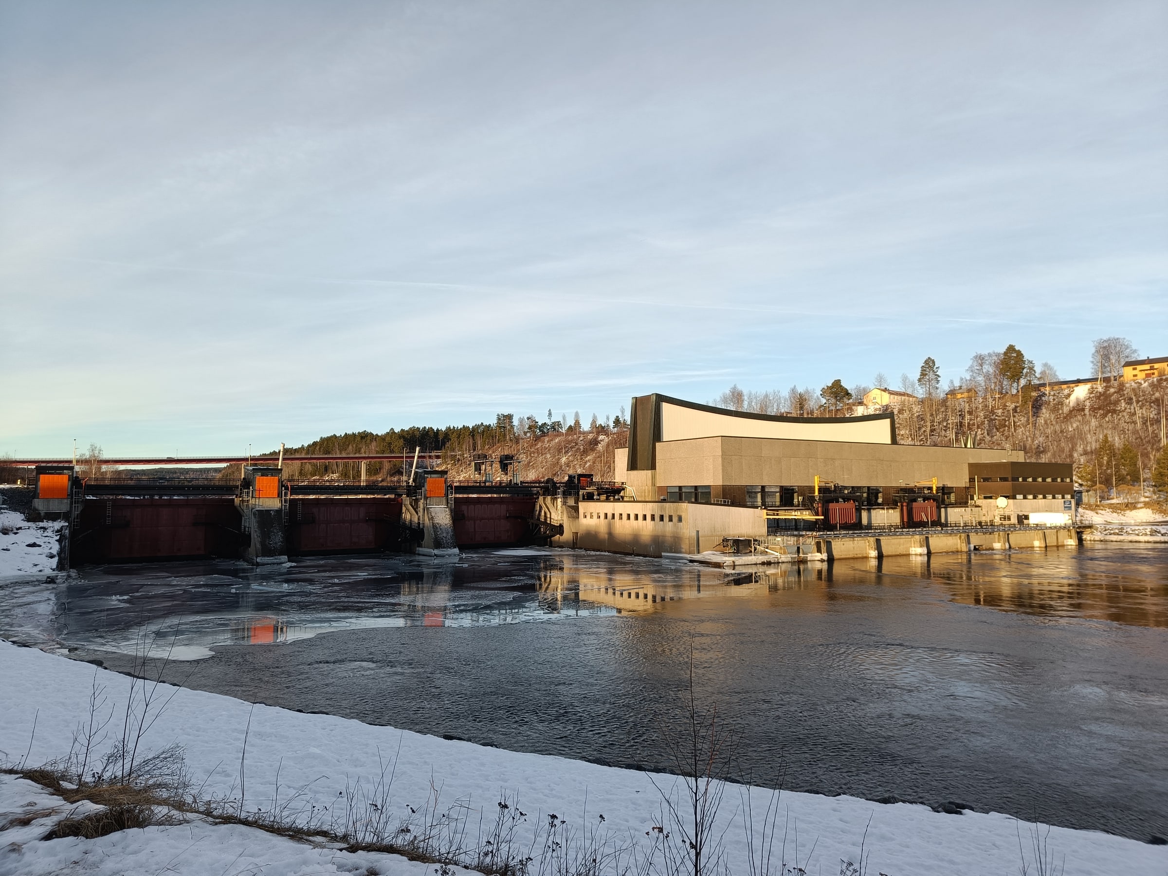 The Sollefteå hydroelectric power plant spans the Ångerman River in winter.